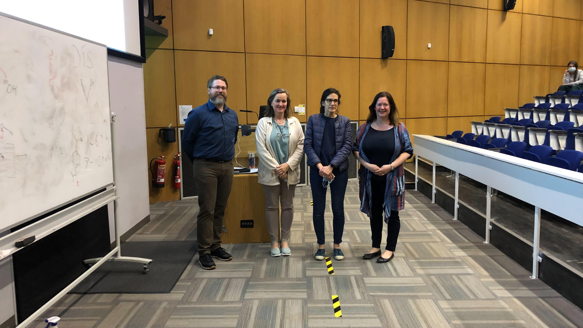 Group of lecturers and teachers in lecture hall